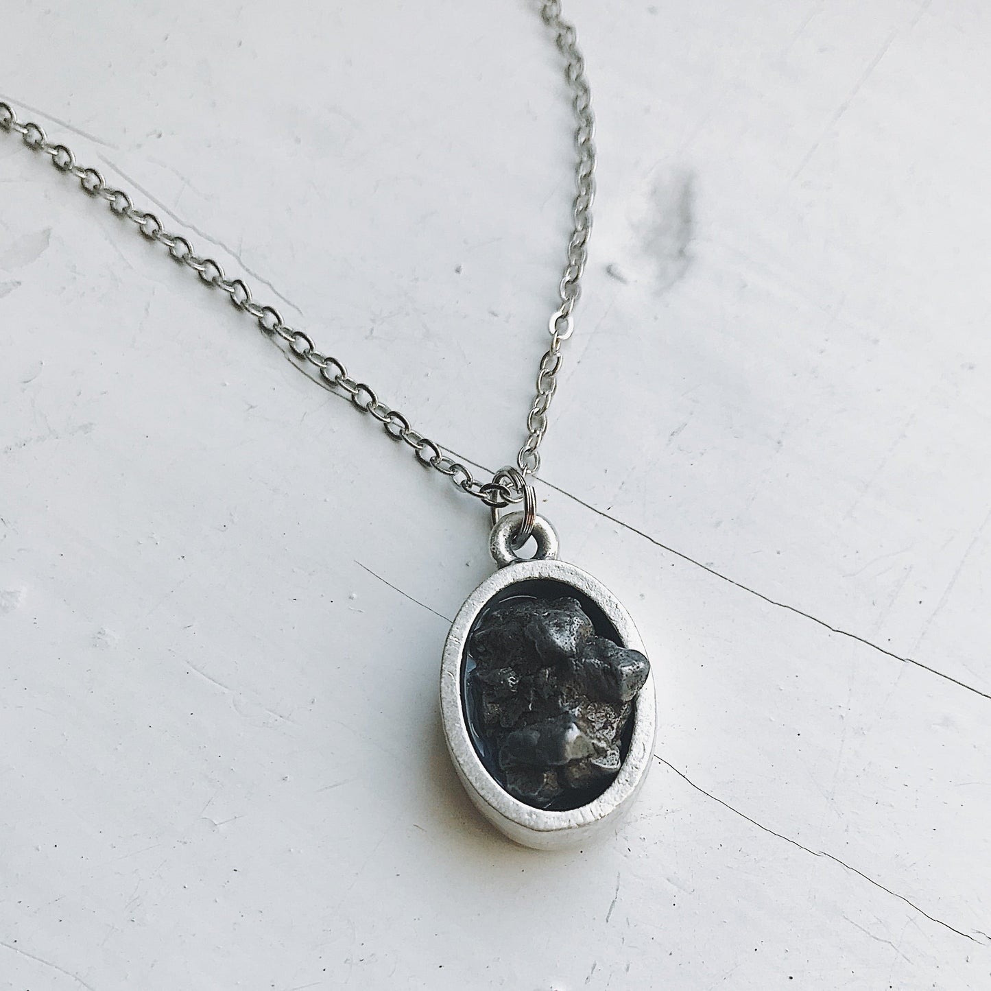 Handmade Oval Raw Meteorite Pendant Necklace in Matte Brushed Silver