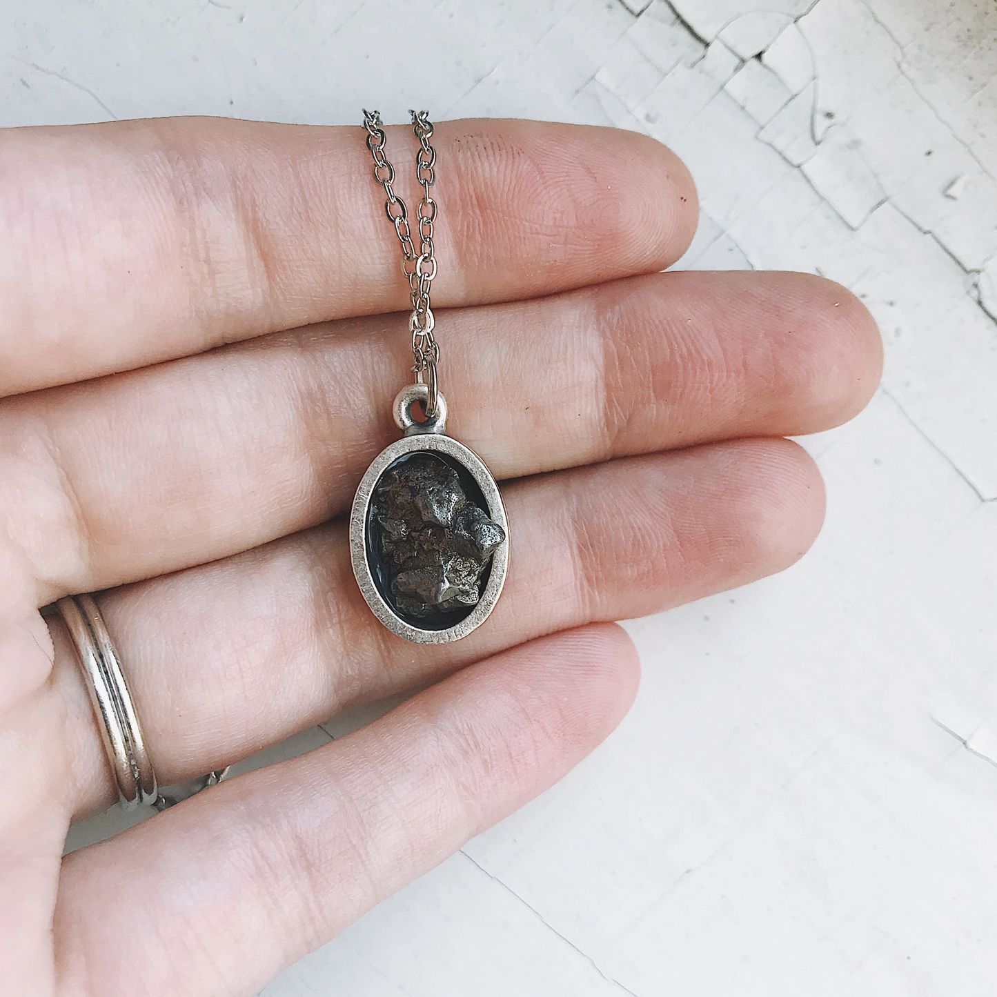 Handmade Oval Raw Meteorite Pendant Necklace in Matte Brushed Silver